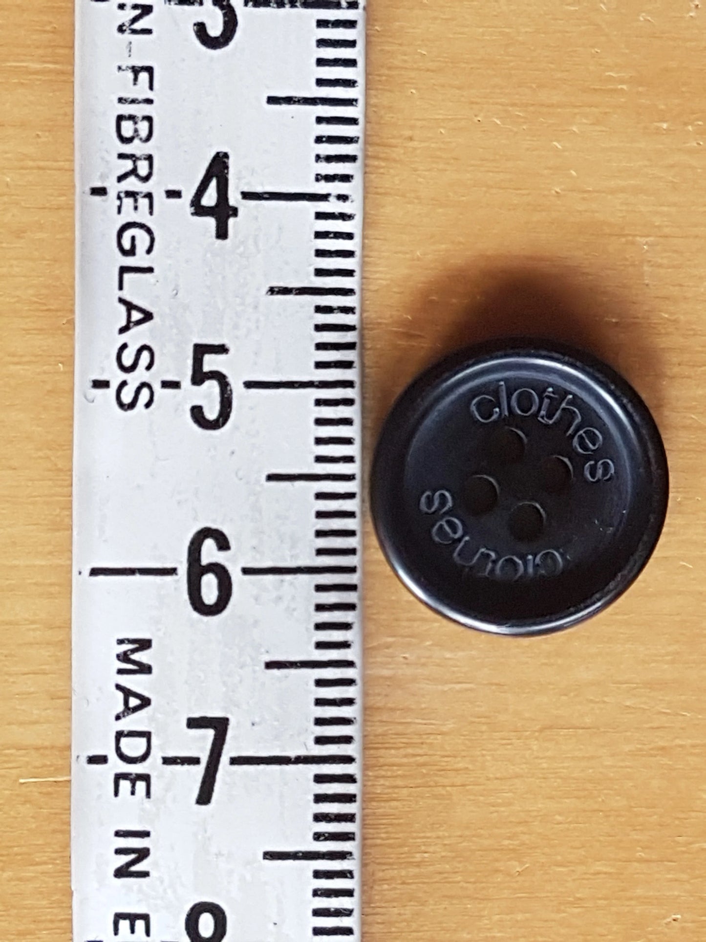7 Round Buttons Black Plastic 1.5cm