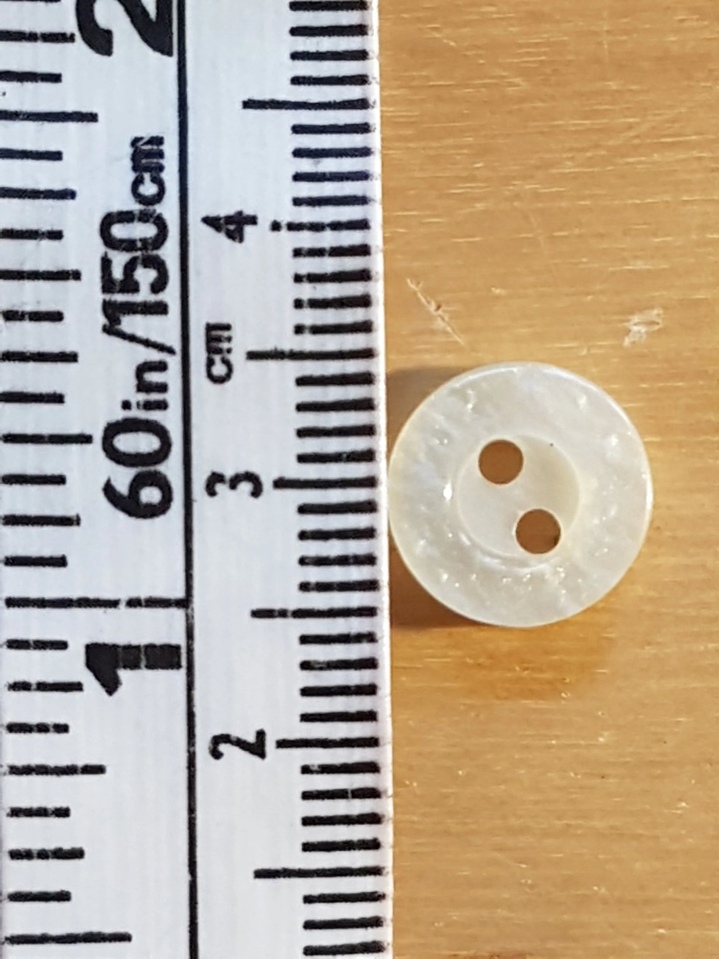 8 Small Round Plastic Cream/Pale Yellow/Pearlised Buttons 1cm