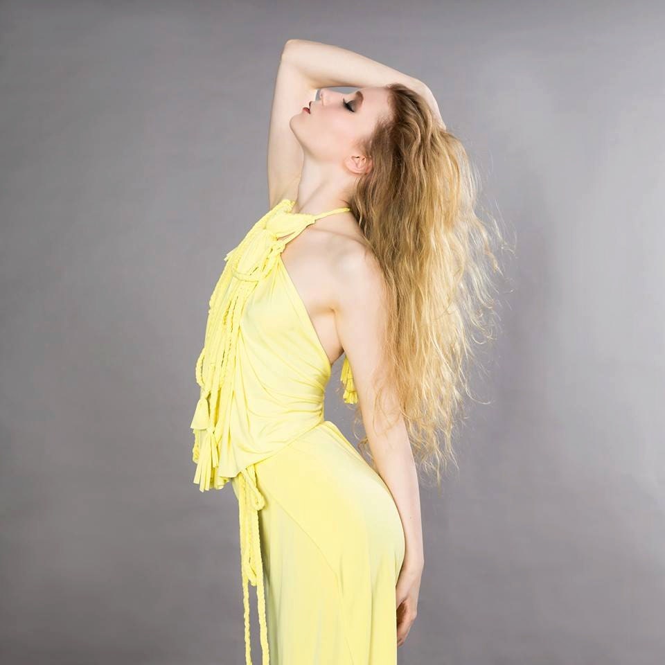 Pale Yellow Two Piece Top And Skirt