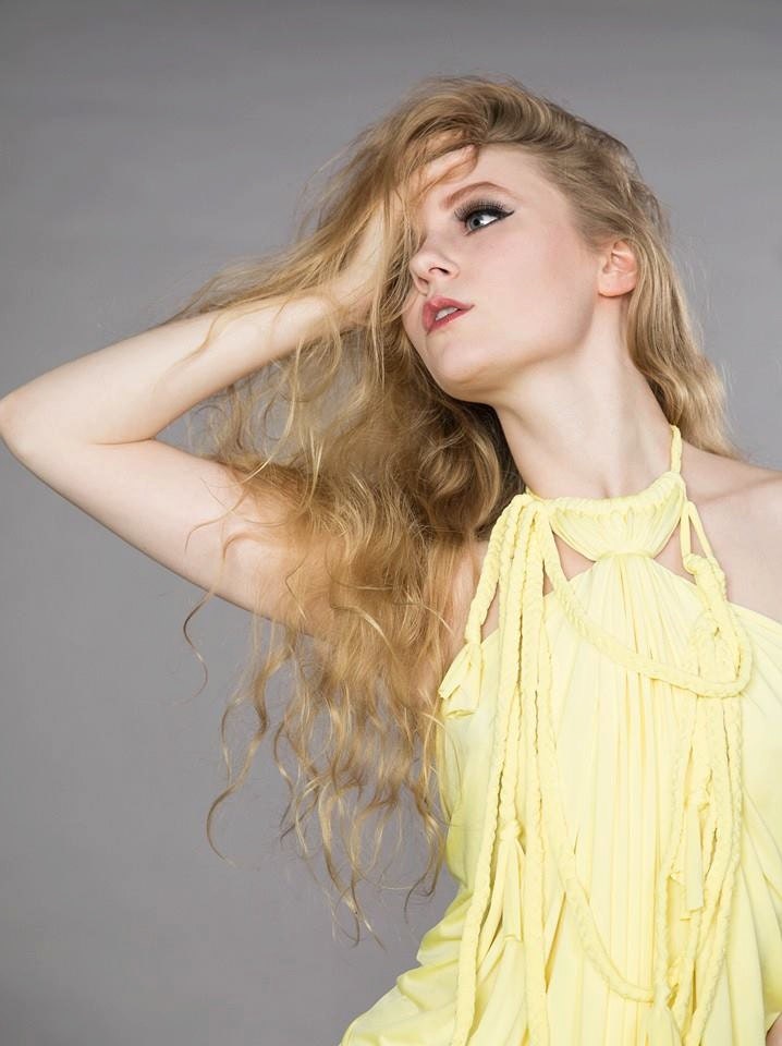 Pale Yellow Two Piece Top And Skirt