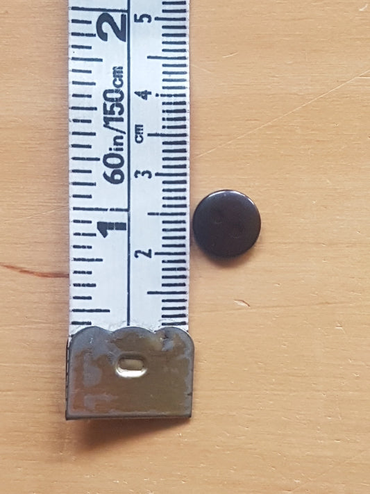 7 Round Buttons Black Plastic 0.75cm