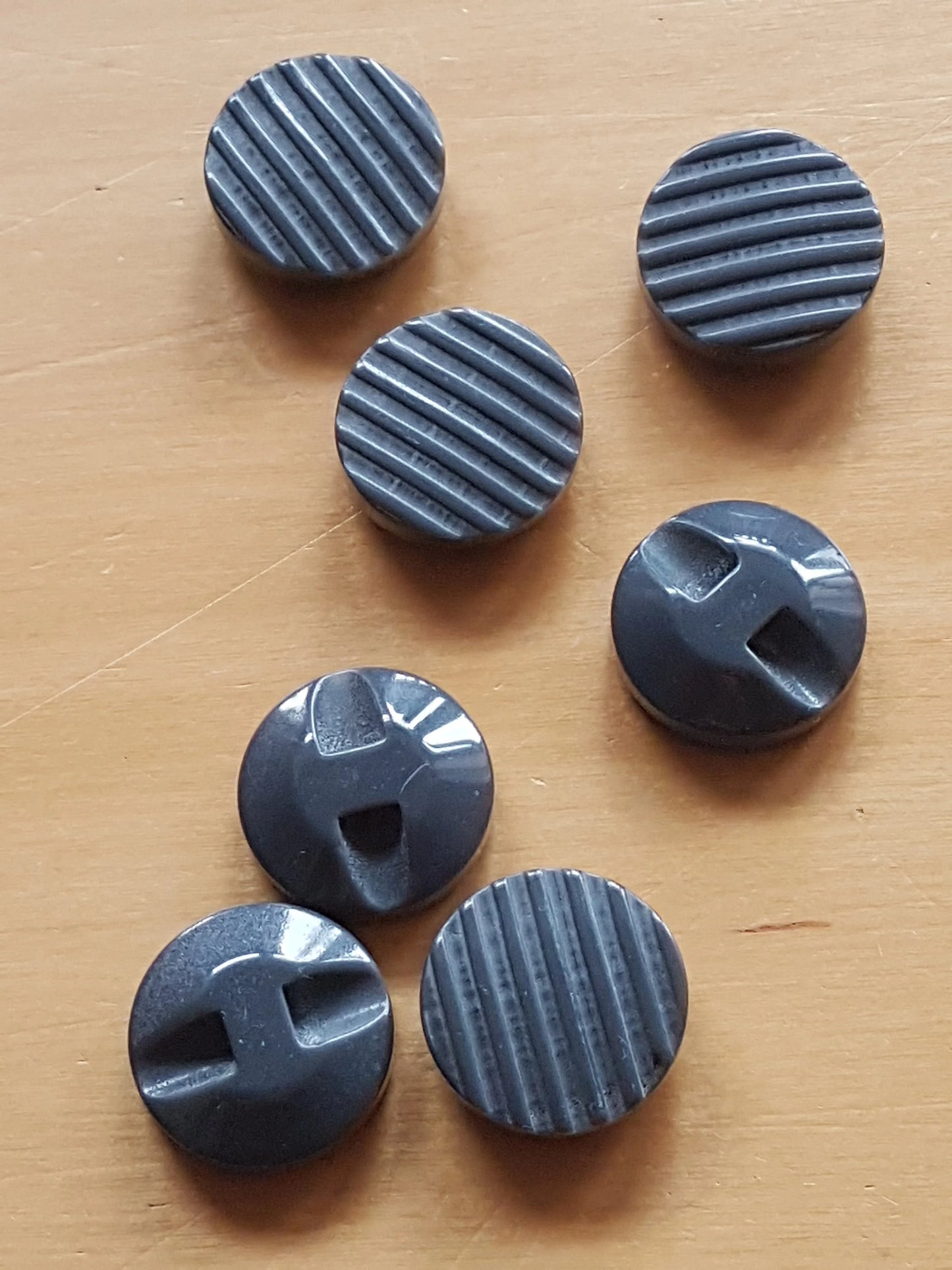 7 Round Retro Buttons Dark Grey Plastic 2.25cm